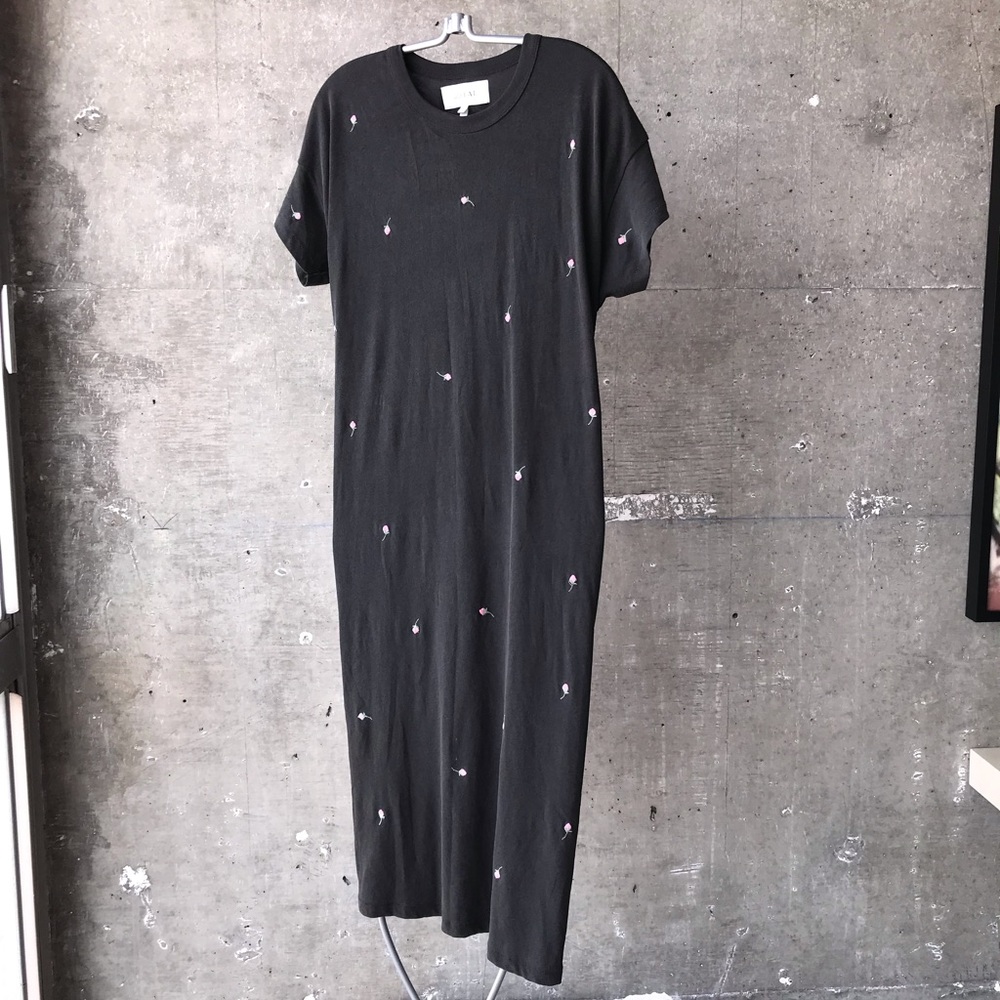 Black cotton dress with embroidered pink roses.